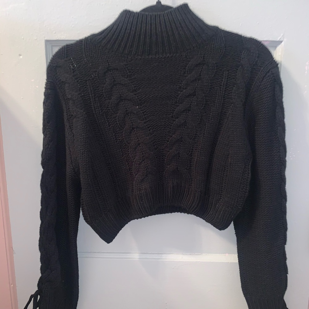 Cropped black turtleneck sweater
